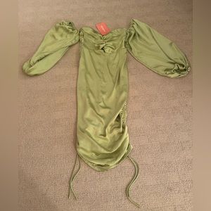 Thatssofetch strapless dress, green, size 8,adjustable sides.Never worn;has tags